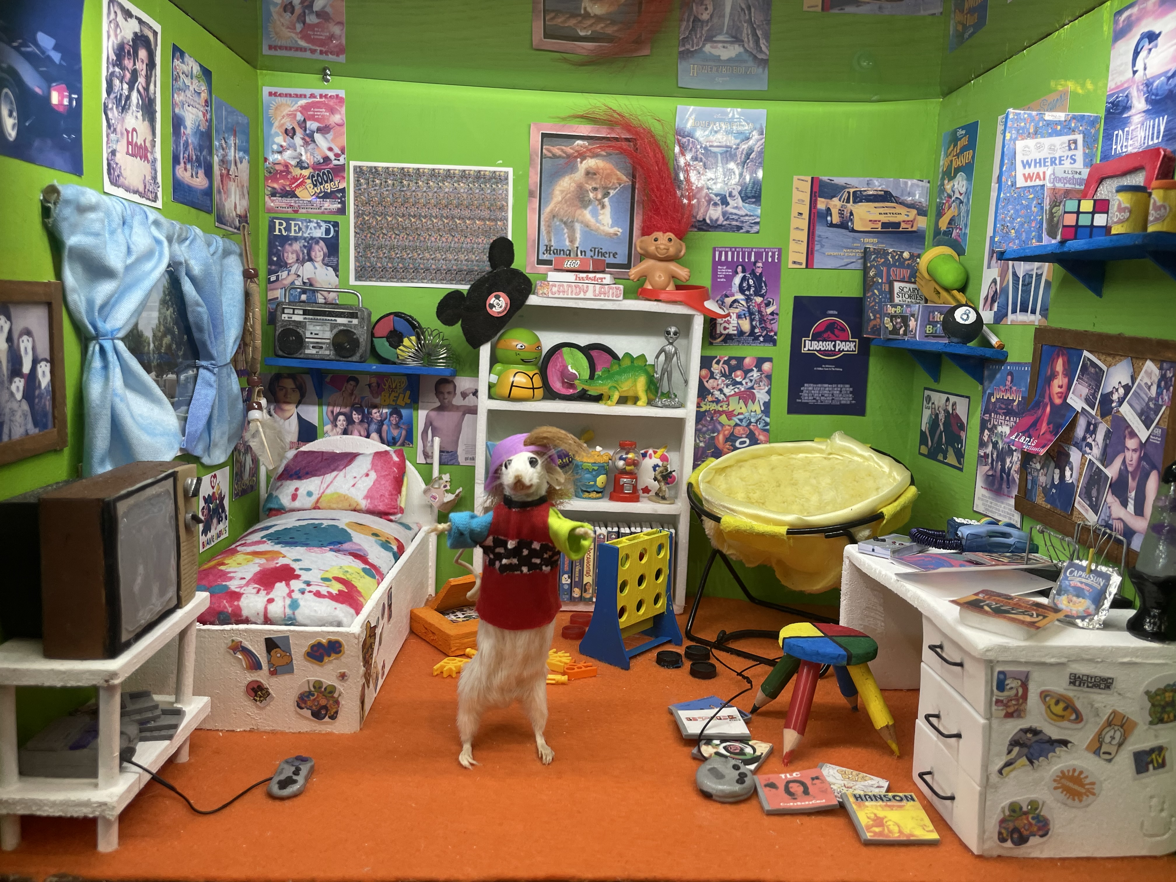 Miniatures bedroom scene with taxidermied mouse